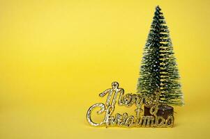 Merry Christmas wishes and Christmas tree on yellow cover with customizable space for text photo