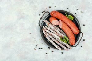 Dry smoked sausages, salami, kabanos photo