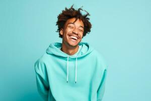 AI Generated. Joyful Young Adult Man with Bright Smile in Turquoise Hoodie photo