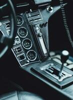 a close up of the dashboard of a vintage car photo