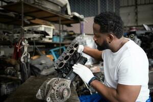 Men repairing car engine in auto repair shop, Selective focus. photo