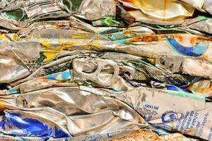 a pile of aluminum cans and other metal items photo