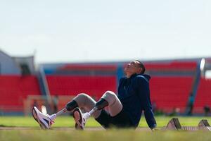 Athletes with disabilities take a break at the stadium between training sessions. photo