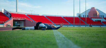 Atletas con discapacidades tomar un descanso a el estadio Entre formación sesiones foto