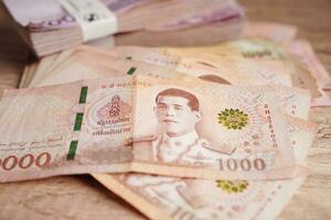 tailandés baht billete de banco dinero, inversión economía, contabilidad negocio y bancario. foto