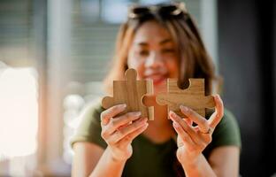 Jigsaw puzzle pieces are important to work on. Team unity Teamwork wooden parts photo