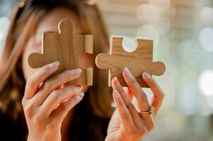Jigsaw puzzle pieces are important to work on. Team unity Teamwork wooden parts photo