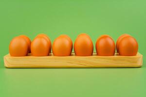 Chicken eggs arranged in egg casings. Brown eggs. Fresh breakfast eggs that are high in protein. animal egg shell photo