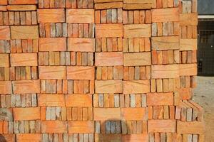 Plant for the production of bricks from clay. Plant for production building material with ready brick, construction industrial photo
