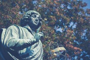 Nicolaus Copernicus statue in Torun, Poland photo