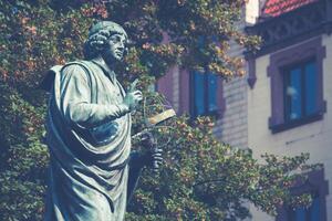 Monument of great astronomer Nicolaus Copernicus, Torun, Poland photo