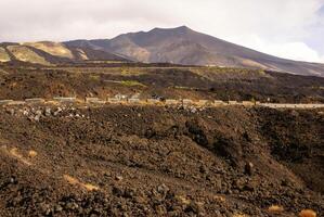 View of the volcanic landscape around Mount Etna photo