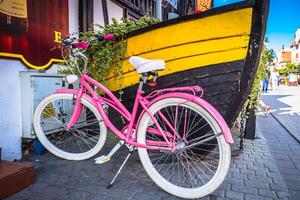Vintage bikes on the street in the Hel,Poland photo