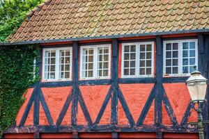 half timbered traditional house in ribe denmark photo