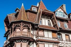 Stylized half-timbered house. Etretat is a commune in the Seine photo