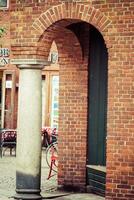 Street with old houses from royal town Ribe in Denmark photo