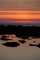 Sunset on the beach with beautiful sky photo