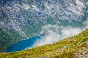 Beautiful norwegian landscape with mountains on the the way to trolltunga photo