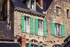 Roofs and houses from the village under the monastry on the Mountain Saint Michel photo