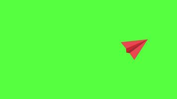 hecho a mano origami papel avión volador en un verde antecedentes. 2d animación video