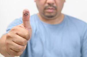 Employees who scan fingerprints show ID match to log in to security and information systems in cloud computers, photo