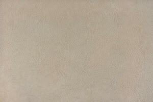 Texture background of beige velours fabric textured like leather surface photo
