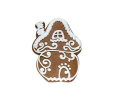 gingerbread cookie in the shape of a house isolated on white background photo