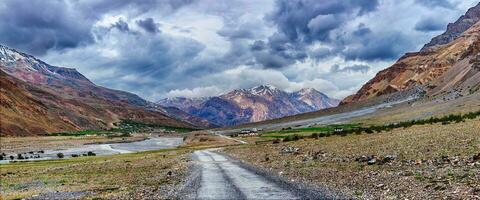 Panorama of road in Himalayas photo