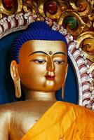 Sakyamuni Buddha statue in Buddhist temple photo