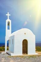 Greek traditional white washed orthodox church photo