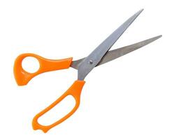 multipurpose scissors with orange or yellow handle isolated on white background with clipping path photo
