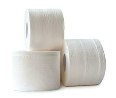 three rolls of white tissue paper or napkin in stack prepared for use in toilet or restroom isolated on white background with clipping path photo