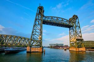 De Hef or Koningshavenbrug railway lift bridge over the Koningshaven in Rotterdam photo