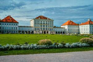 Nymphenburg palace with garden lawn in front in Munich. photo