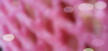 Blurred abstract background of pink pattern color. photo