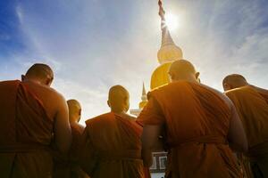 thai buddha monk praying at prathat nadun mahasarakham most important religion landmark in thailand photo