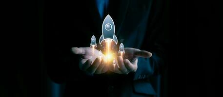 Startup business concept, rocket is launching and flying from hand to sky for growing business, fast business success. startup founder, network connection, idea generation, digital marketing photo