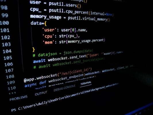 Programming code on a computer screen. Source code photo. Technology background.
