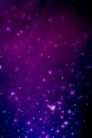 Purple glowing particles background cinematic atmosphere. Glittering sparkling bokeh party overlay with copy space for text. photo