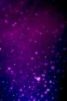 Purple glowing particles background cinematic atmosphere. Glittering sparkling bokeh party overlay with copy space for text. photo