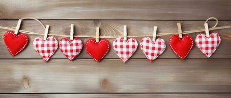 AI generated Hearts hanging on rope over wooden background. Valentines day background photo