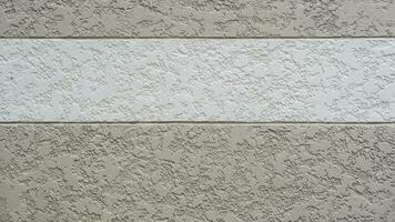 White horizontal line pattern on beautiful Decorative Roughness Texture surface of gray Concrete Wall outside of vintage house photo