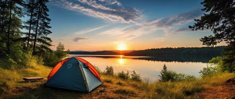 AI generated Camping tent on the shore of a lake at sunset. photo