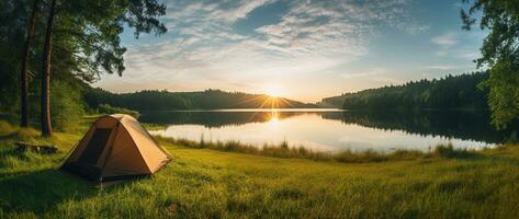 AI generated Camping tent on the shore of a lake at sunset. photo