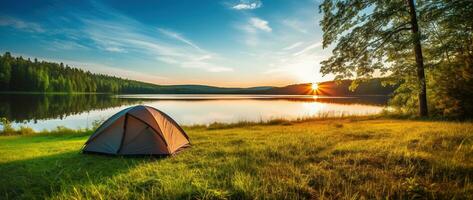 ai generado cámping tienda en el apuntalar de un lago a puesta de sol. foto