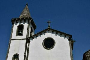 a church with a bell tower photo