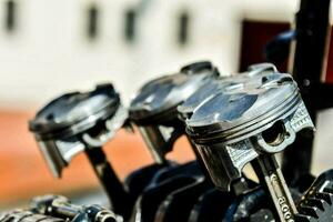 a close up of four motorcycle engines photo