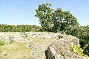 the stone walls of the old castle photo