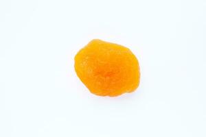 Dried apricot isolated on a white background. Top view, flat lay. photo