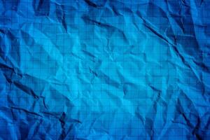 Wrinkled blue paper texture background photo